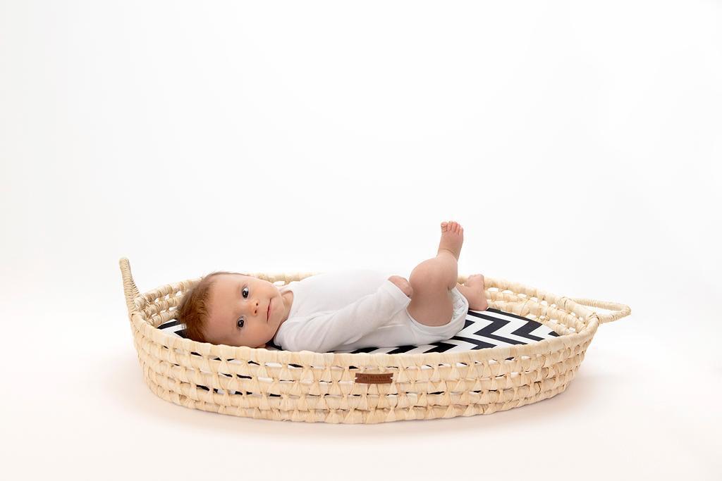 "Farewell to Conventional Diaper Changes: Embrace the Distinctive Corn Husk Changing Basket"